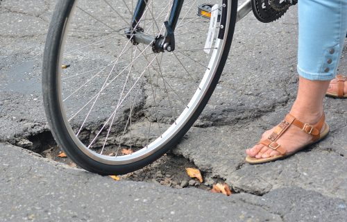 Did a Pothole Cause Your Bike Accident? Learn Who Could Be Held Accountable 