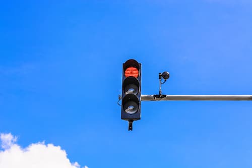 The Facts About Red Light Cameras: Do They Work? Can They Help? Are They Worth It?